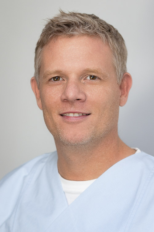 Dr. Christian May Dr. Christian May